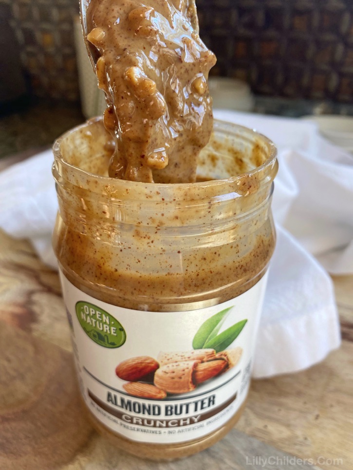 How To Easily Stir Natural Nut Butters -- Simple tips and tricks that will make stirring peanut butter and almond butter super easy without the mess.
