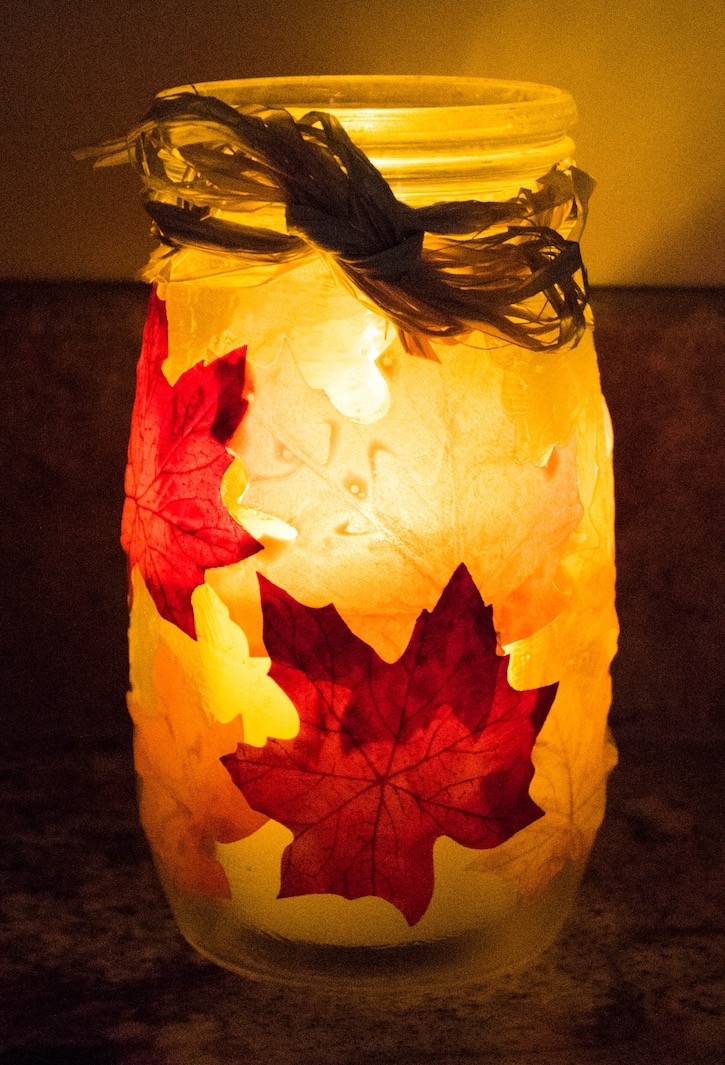 DIY Glass Jar Candle Holder with Fall Leaves | If you're looking for easy fall crafts to make for adults, this fall candle holder is awesome for home decor and for giving away as gifts. 