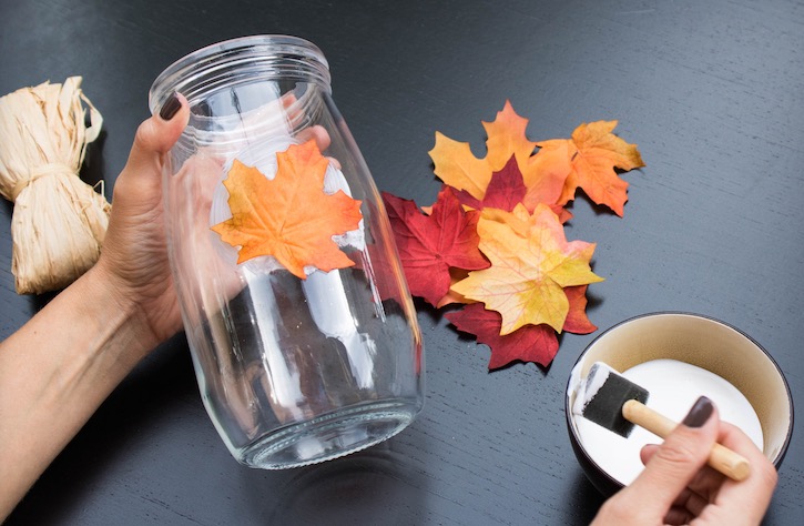 Tutorial on how to make a DIY Fall Leaf Candle Holder. This easy adult craft makes for beautiful home decor during the Autumn season. 