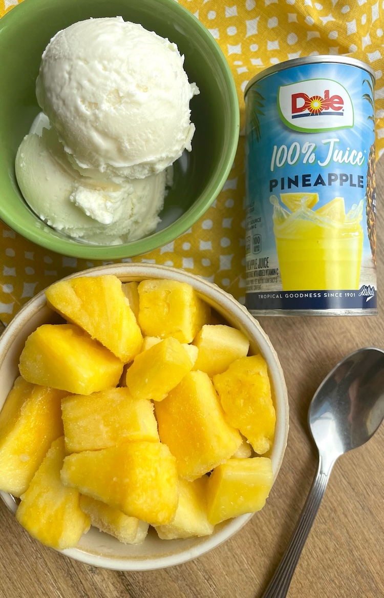 The Easiest Homemade Pineapple Dole Whip Recipe made with ice cream, frozen pineapple chunks, and pineapple juice. Simply mix in a blender until smooth and creamy!