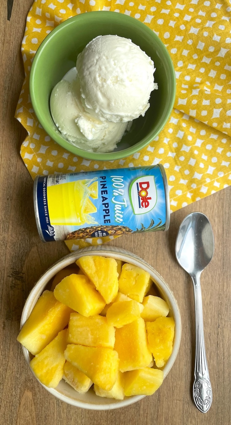 This easy summer time treat is easy enough for kids to make! Simply mix these 3 ingredients in a blender to make the famous Disney Pineapple Dole Whip. A yummy summer time treat that will keep you cool and happy.