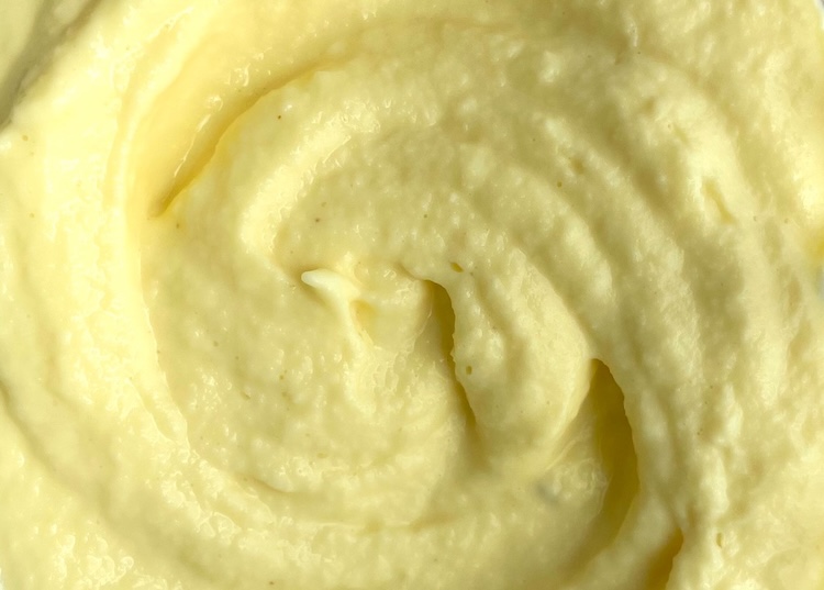 Smooth and creamy pineapple dole whip in a blender, ready to be served as an awesome summer time dessert. 