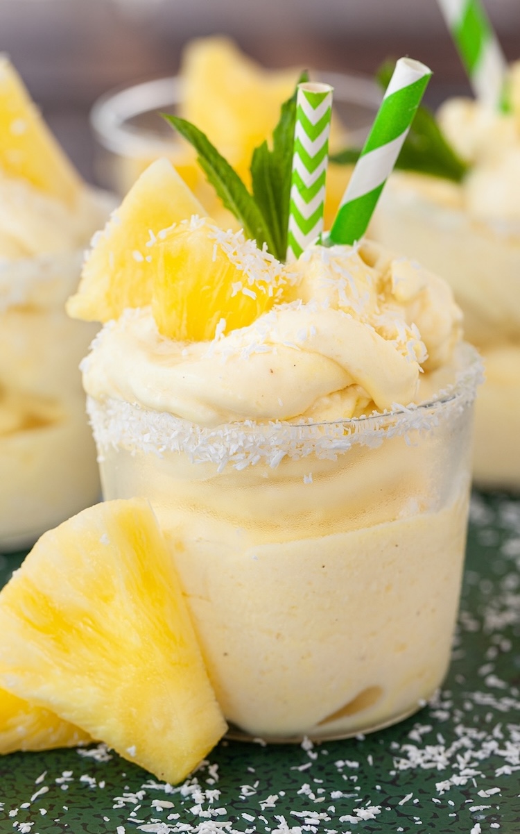 Delicious Pineapple Dole Whip Recipe | This Disneyland copycat recipe is simple to make in a blender with just a few frozen ingredients. Make this for your next pool party! It's a yummy summer time treat that both kids and adults will enjoy. 