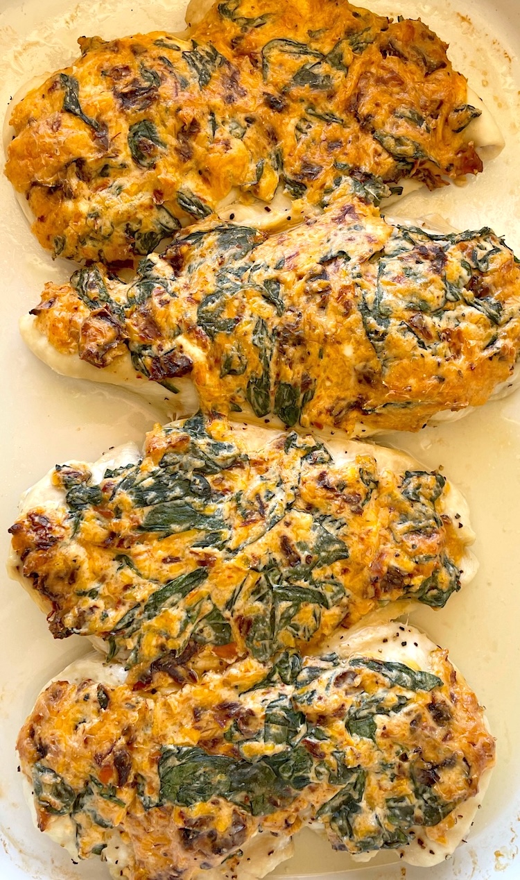 Delicious creamy sun-dried tomato chicken breasts after baking in the oven. 