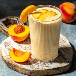 How to make a healthy creamy peach smoothie with plain greek yogurt and almond milk. No sugar added!